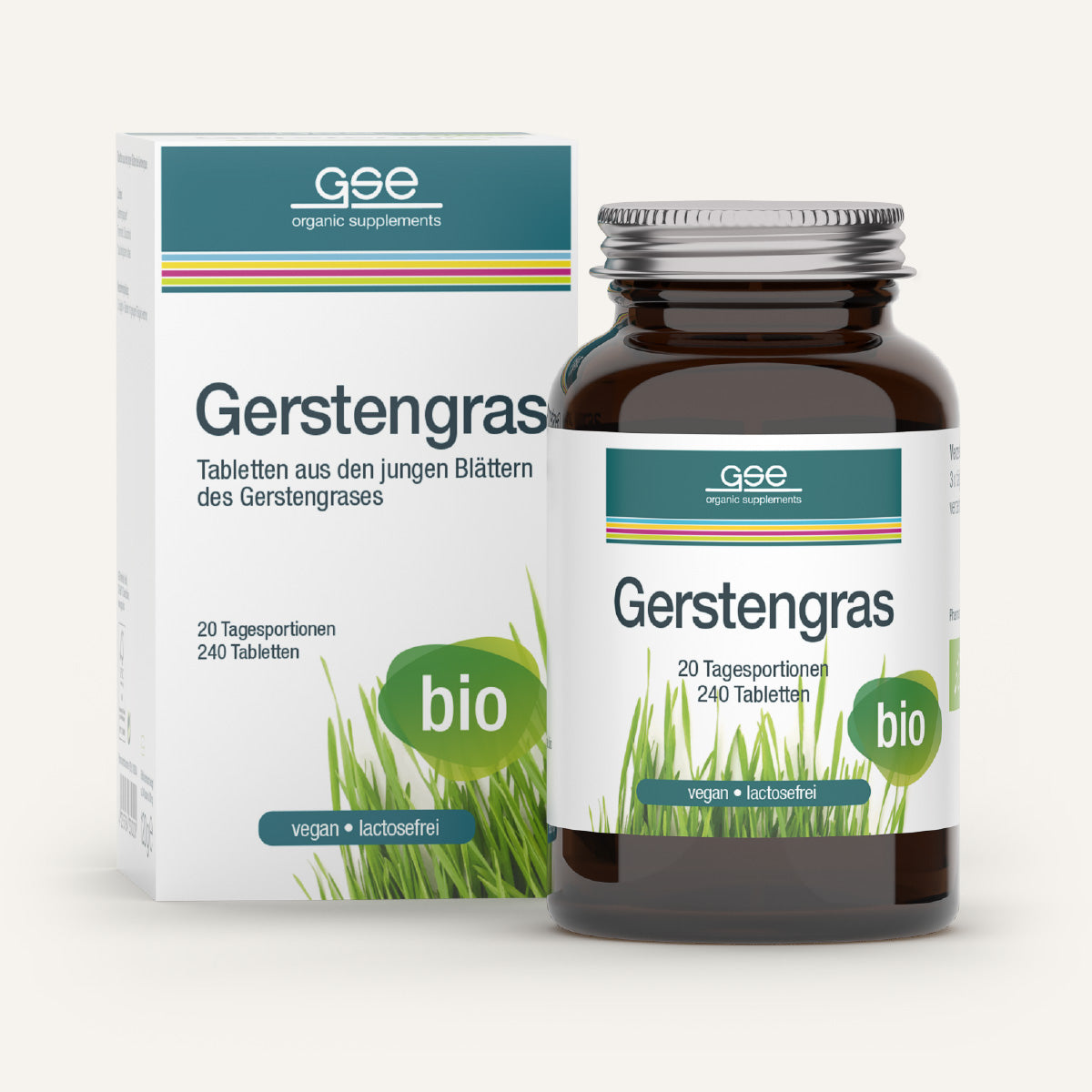 Eine Schachtel und eine braune Glasflasche von Gerstengras Tabletten (Bio) von gse.organic.supplements, bio-zertifiziert, vegan, laktosefrei. Die Verpackung zeigt grüne Grasmotive und "Bio". Nährstoffreiches Getreidegras für die tägliche Ernährung.