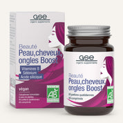 Eine Schachtel und eine Flasche von gse.organic.supplements mit der Aufschrift "Beauty Haut, Haare, Nägel Boost (Bio) FR" mit einem stilisierten Frauengesicht. Die Verpackung hebt B-Vitamin, Selen, Kieselsäure und die Bio-Zertifizierung hervor.