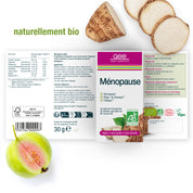 Zwischen Wurzelgemüsescheiben und einer ganzen Feige liegt eine Packung Ménopause (Bio) von gse.organic.supplements, die auf Französisch beschriftet ist; sie ist biologisch, vegan, glutenfrei, laktosefrei, unterstützt die Wechseljahre und enthält B-Vitamine für den Hormonstoffwechsel.