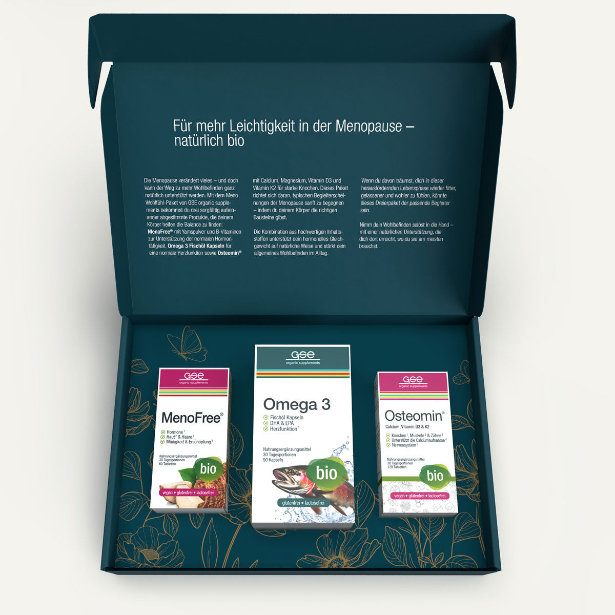 Eine geöffnete dunkelgrüne Schachtel von gse organic supplements zeigt das "Meno Wohlfühl Paket", das drei "Bio"-Präparate enthält. Auf dem Innendeckel steht ein deutscher Text über Wechseljahre und natürliche Ergänzungsmittel wie B-Vitamin und Yamswurzelpulver.