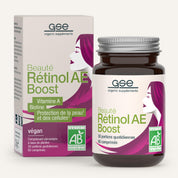 Eine Schachtel und eine Flasche gse.organic.supplements Beauty Retinol-AE Boost (Bio) FR, die das Profil einer Frau mit wallendem Haar zeigen. Die vegane Verpackung hebt Retinol, Biotin und Vitamin A hervor.