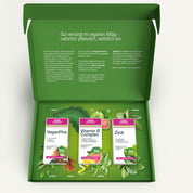 Eine geöffnete grüne Schachtel von gse organic supplements zeigt drei Vegan Life Paket Ergänzungspakete mit Abbildungen von Blattgemüse, Rüben und Basilikum. Der deutsche Text auf der Innenseite des Deckels hebt hervor, dass es ideal für vegane Ernährung ist.